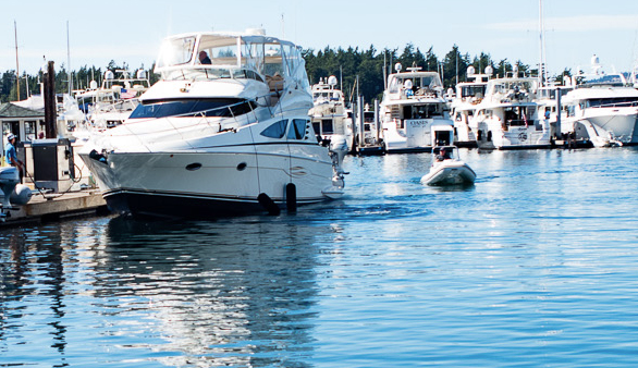 A private luxury boat anchored at the docks.