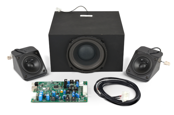 A MISCO OEM system kit with subwoofer, satellite speakers, and a DSP amplifier.
