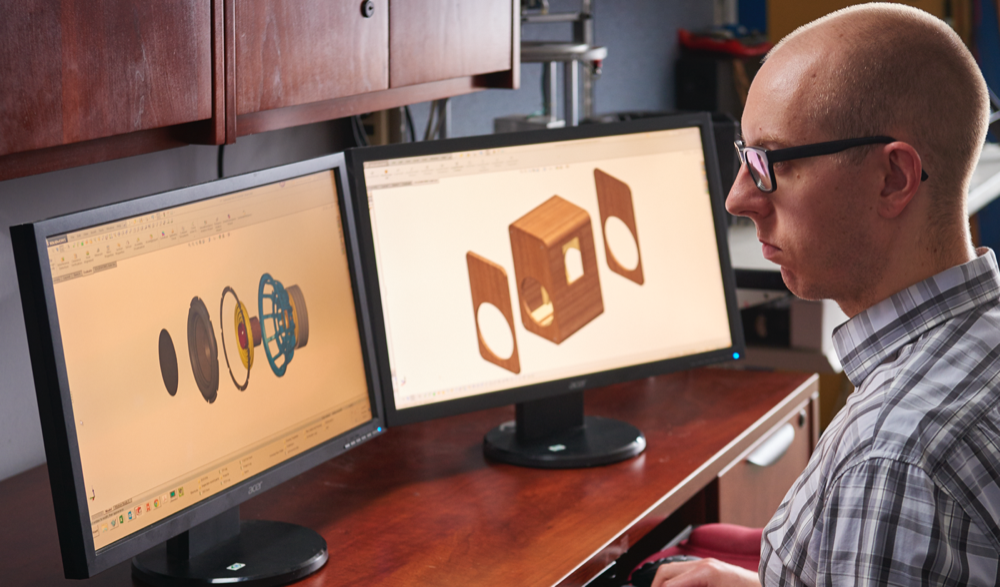 An engineer designing a speaker and enclosure.