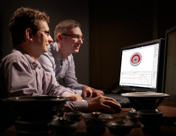 Two MISCO engineers comparing the rocking pattern of different drivers.