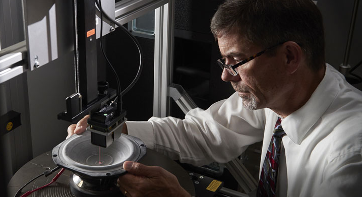 A MISCO engineer setting up a measurement test of a new speaker.