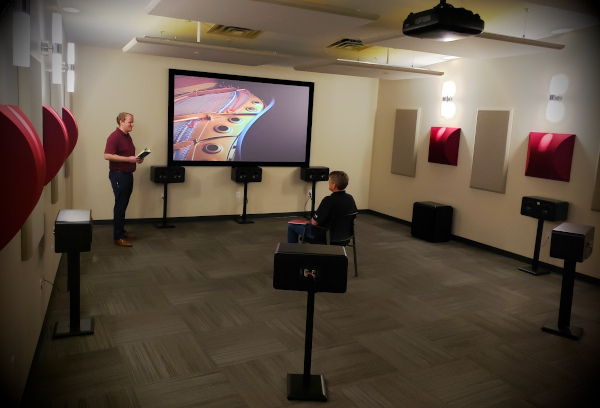 Two MISCO engineers conducting a listening survey.